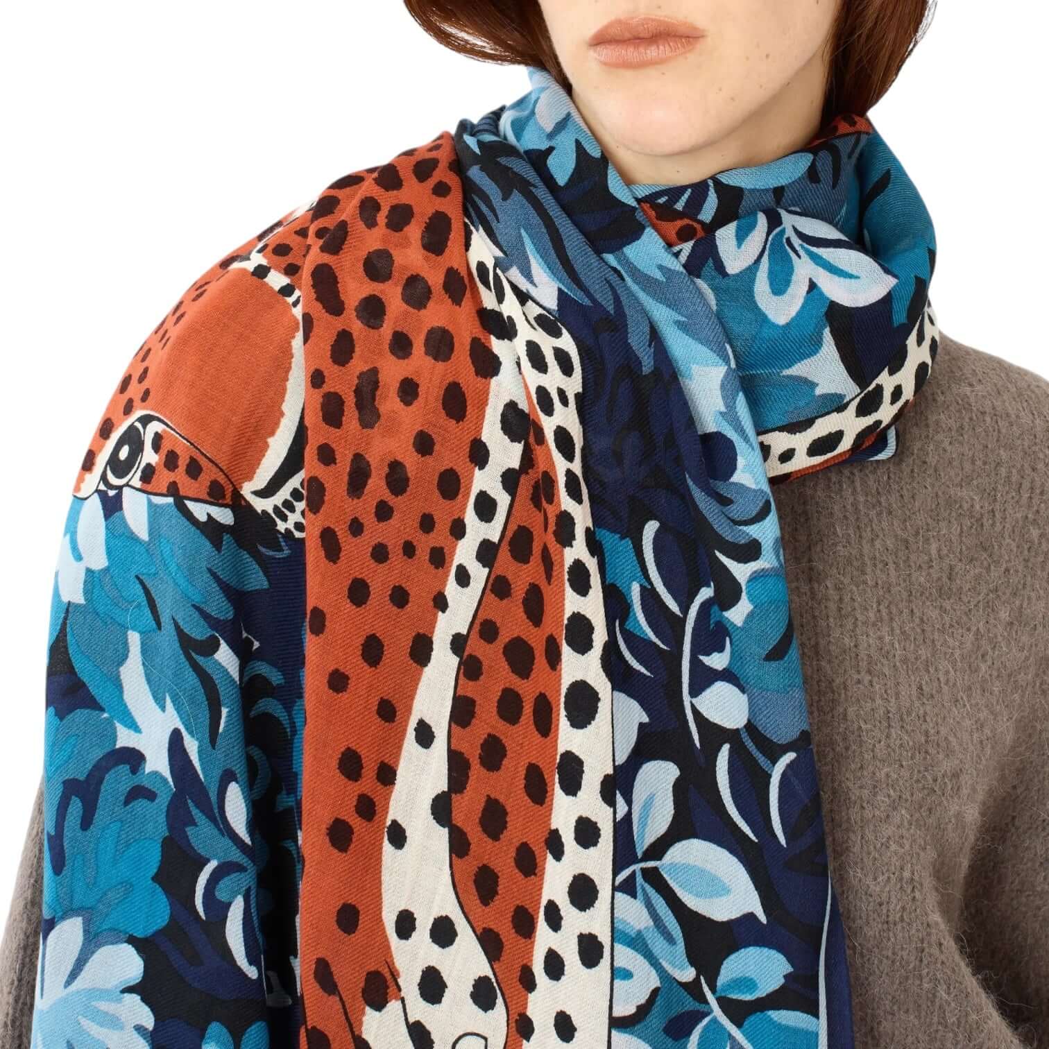 Sciarpa Mike Blu con design creativo in tonalità blu e arancione, misura 70x190cm, 100% lana lavabile.