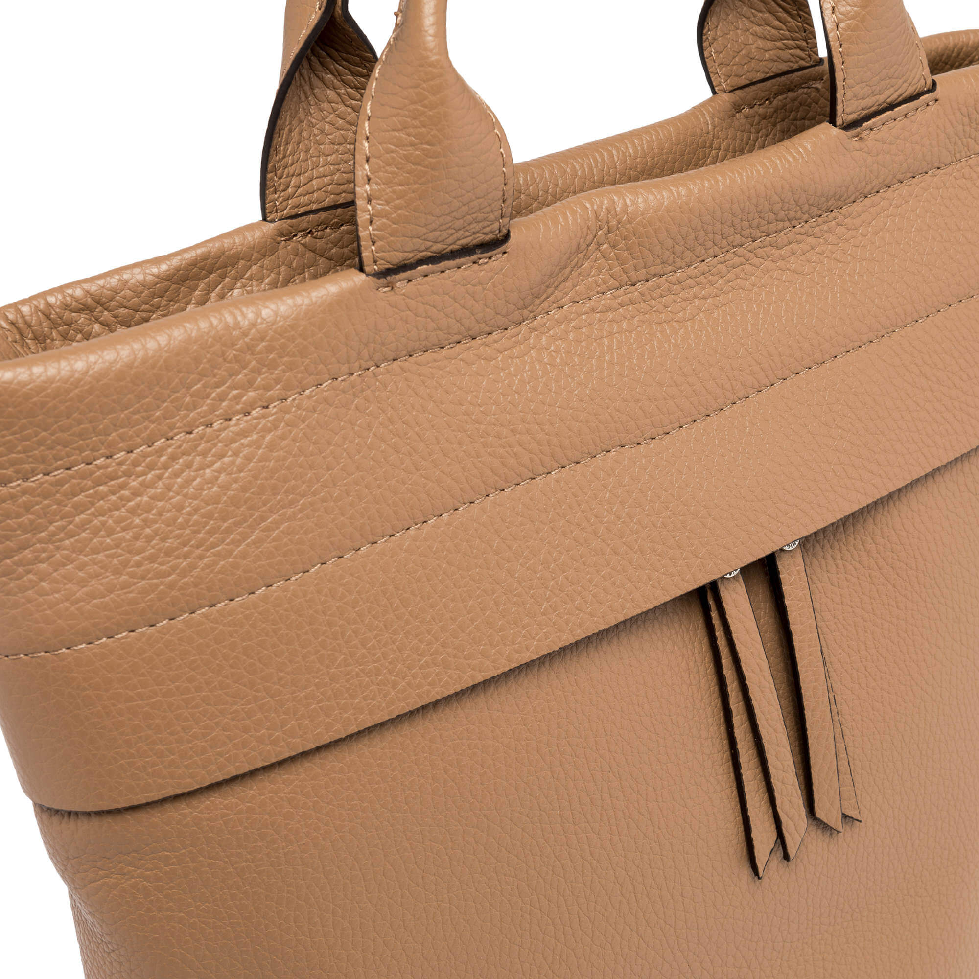 Close-up of Andrea handbag in soft beige leather, showcasing top handle and textured finish.