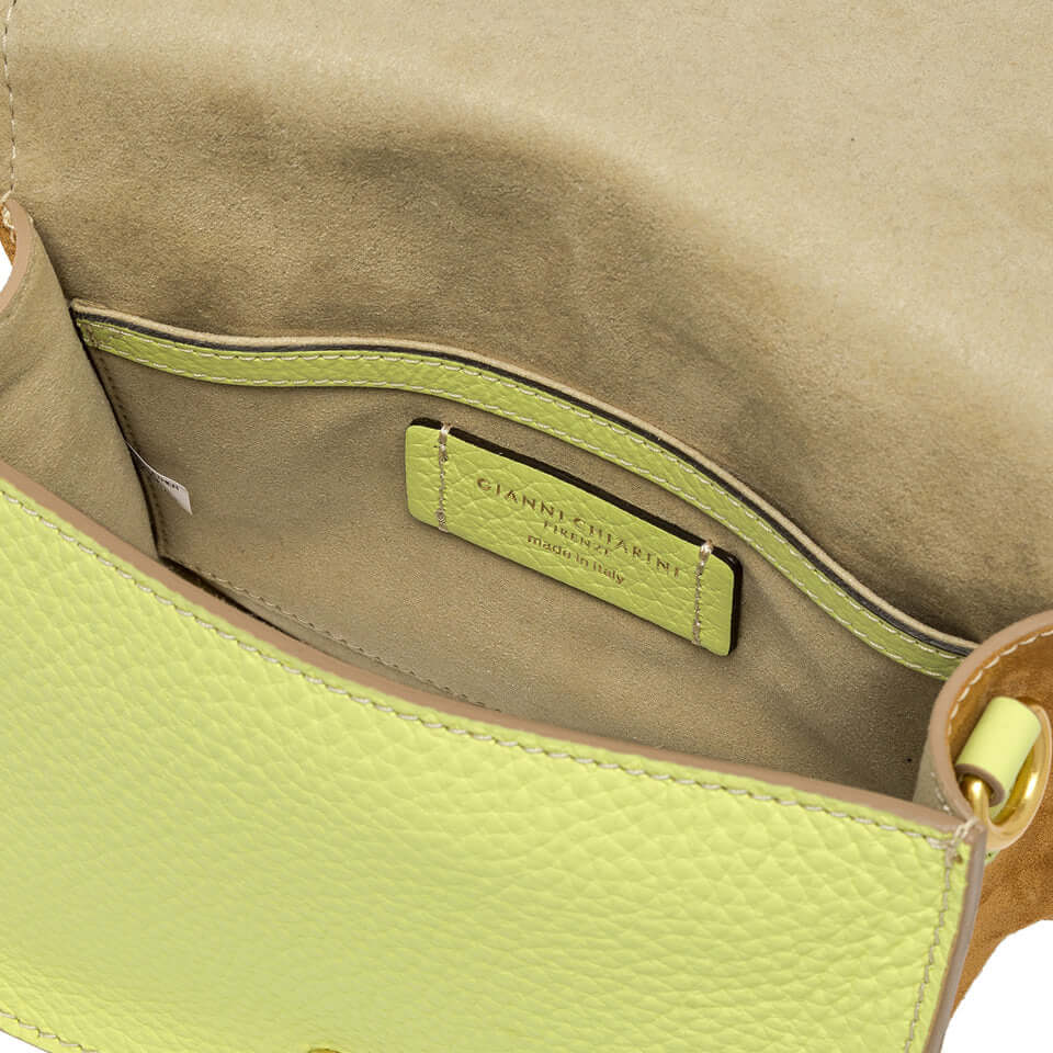 Interior view of the Tara crossbody bag by Gianni Chiarini, showcasing soft suede lining and branded tag.