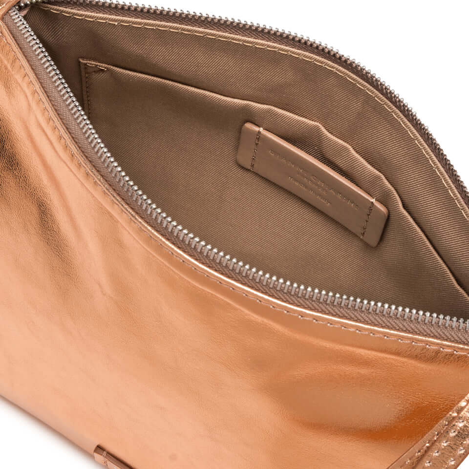 Interior view of the Nora Pouch by Gianni Chiarini, featuring a smooth metallic finish and zip closure.