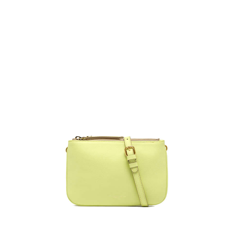 Yellow leather crossbody bag Frida with two zip compartments and adjustable strap, dimensions 24x16x5 cm.