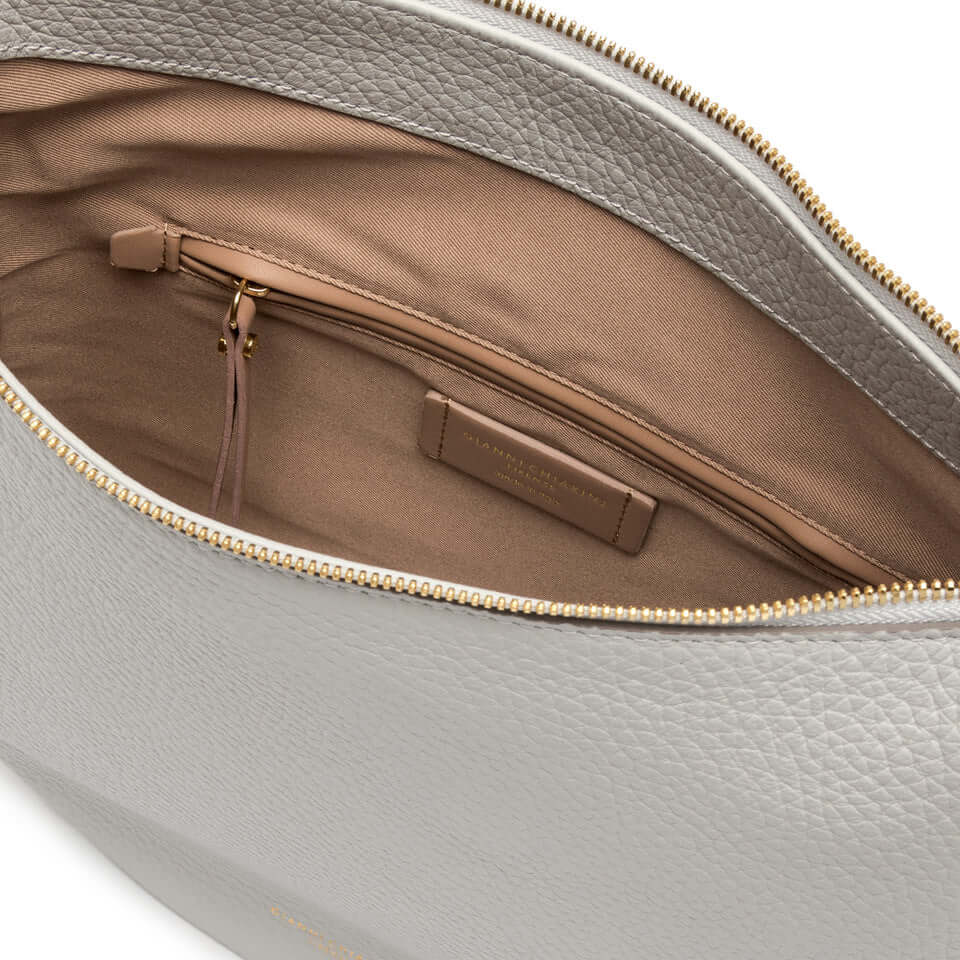 Interior view of large leather shoulder bag Brooke, showing zip pocket and spacious storage.