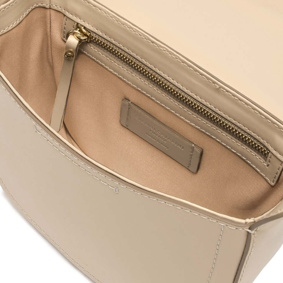 Interior view of the Sandy bag by Gianni Chiarini, featuring a zipper pocket and logo tag.