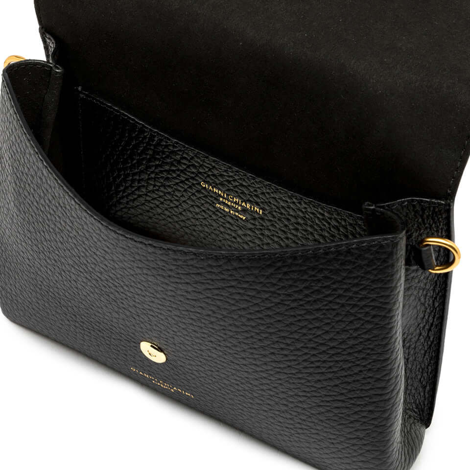 Corallo mini bag in black leather, featuring magnetic closure and decorative ring inside.