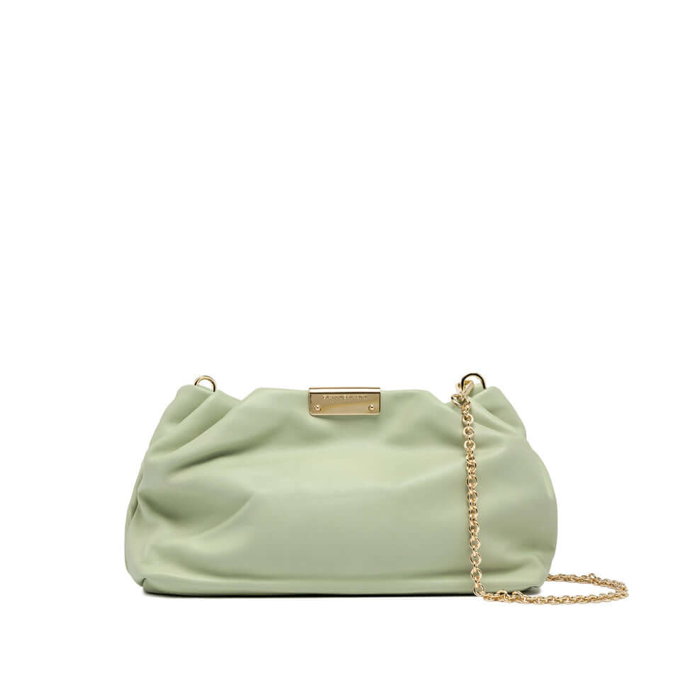 Chic Perla handbag in soft green leather with a gold chain for crossbody or hand carry.