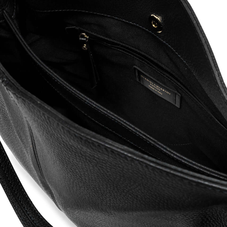 Interior view of the Leila leather shoulder bag by Gianni Chiarini, featuring functional pockets and a sleek design.