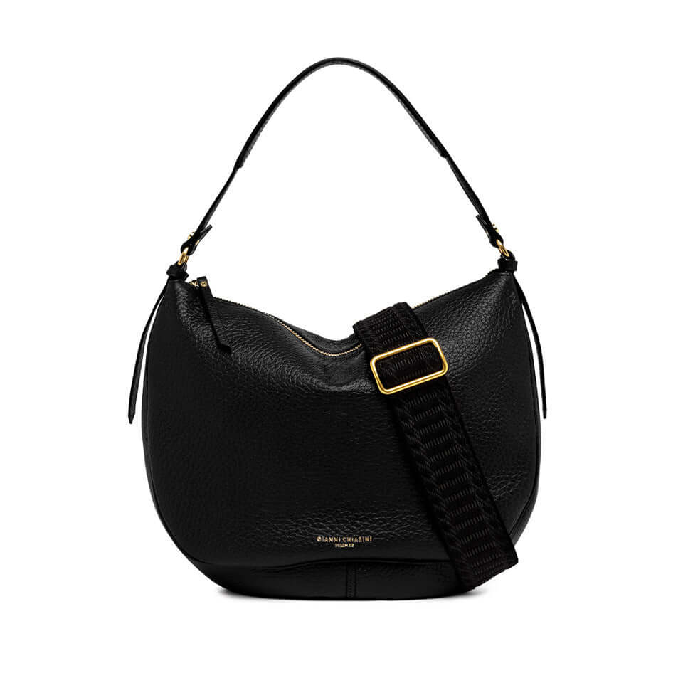 CHIARA black leather handbag with waved base, top zipper, and removable woven shoulder strap.