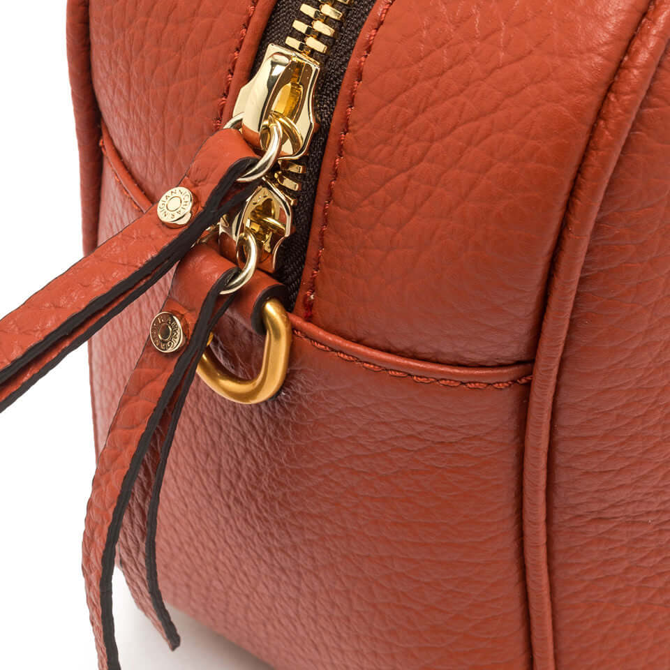 Close-up view of the Chiara vintage leather handbag showcasing the zipper and strap details.
