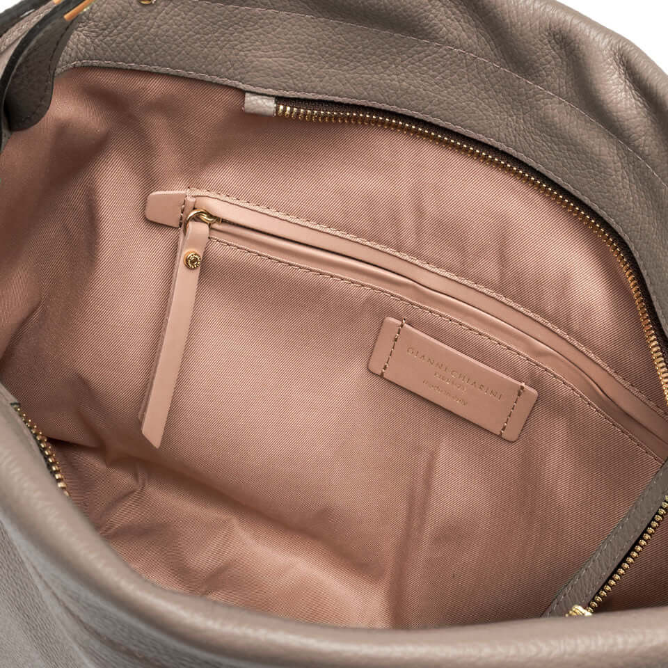 Interior view of the Matilde shoulder bag, featuring a zip pocket and soft lining.