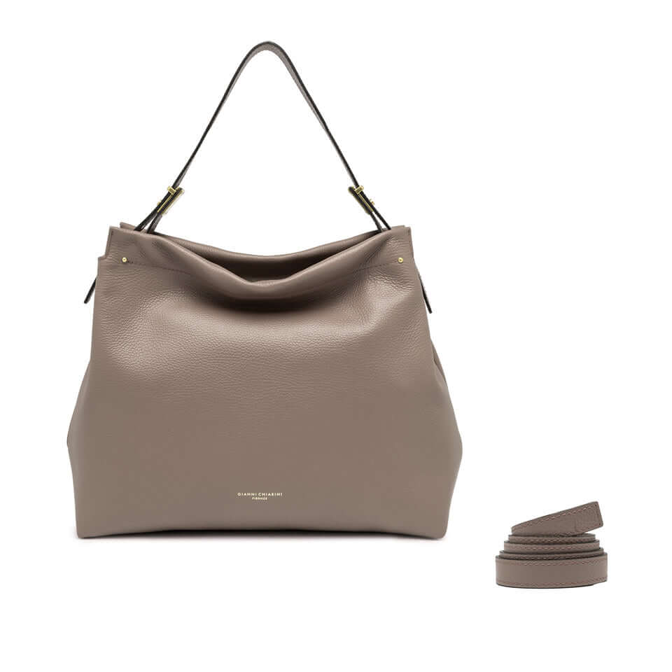 Matilde shoulder bag in soft gray pebbled leather with golden logo, featuring top zip closure and removable strap.