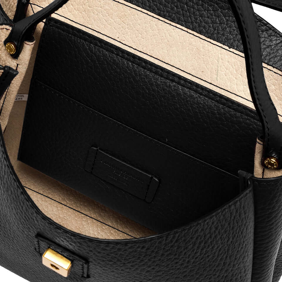 Interior view of the CLIO Gianni Chiarini handbag showing black leather lining and compartments.