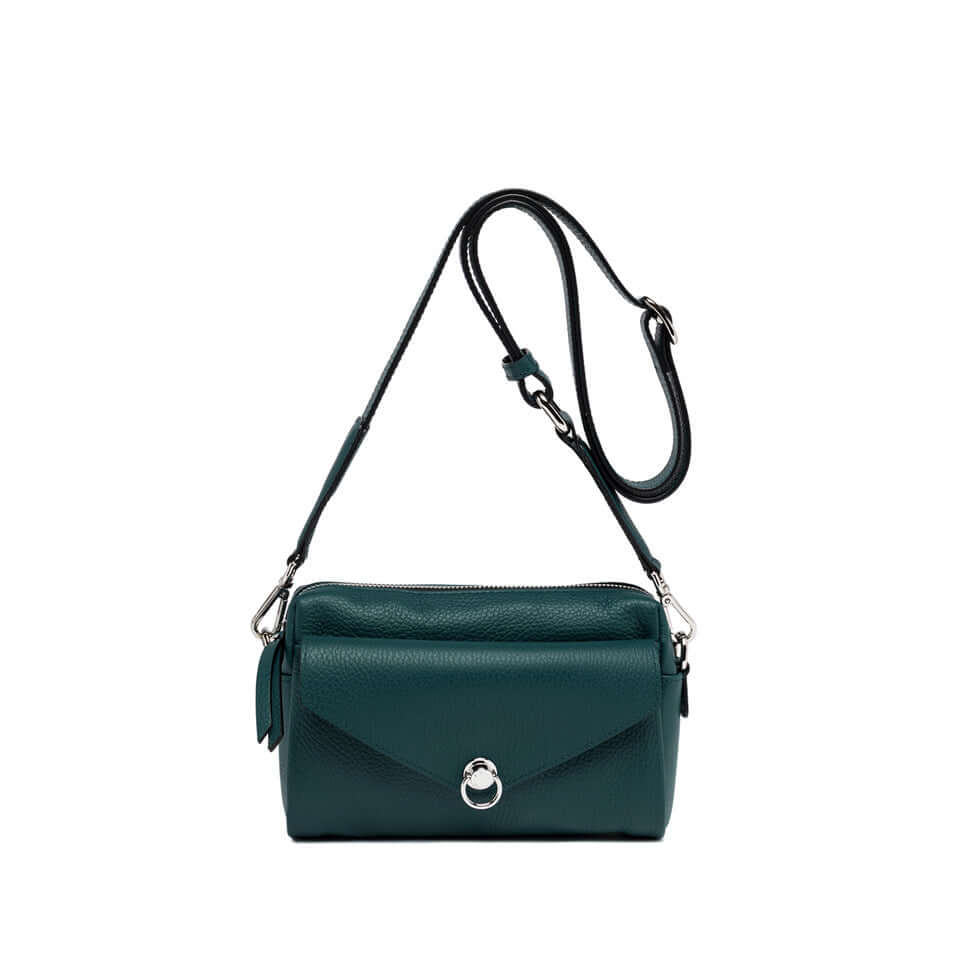 Deva bag in hammered leather, rectangular shape, zip closure, front pocket with iconic piercing, removable shoulder strap.