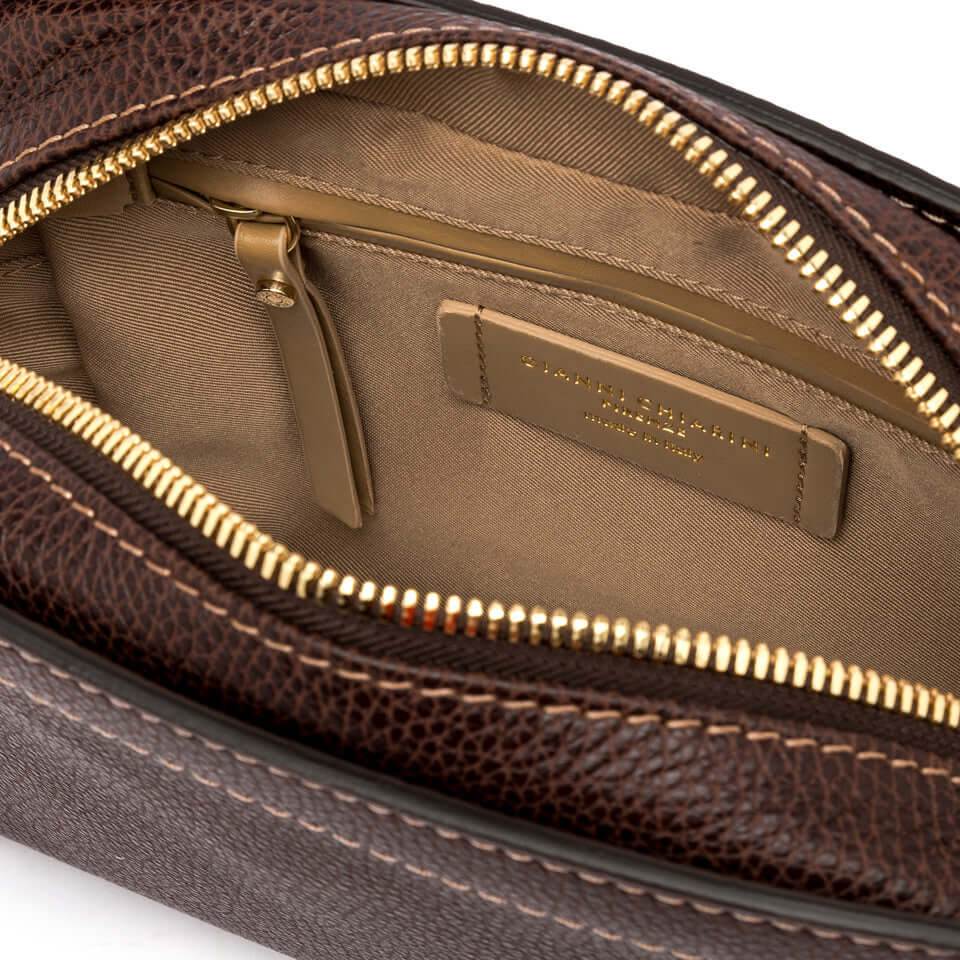 Interior view of OLLY bag by Gianni Chiarini, showcasing the zip closure and luxurious lining.