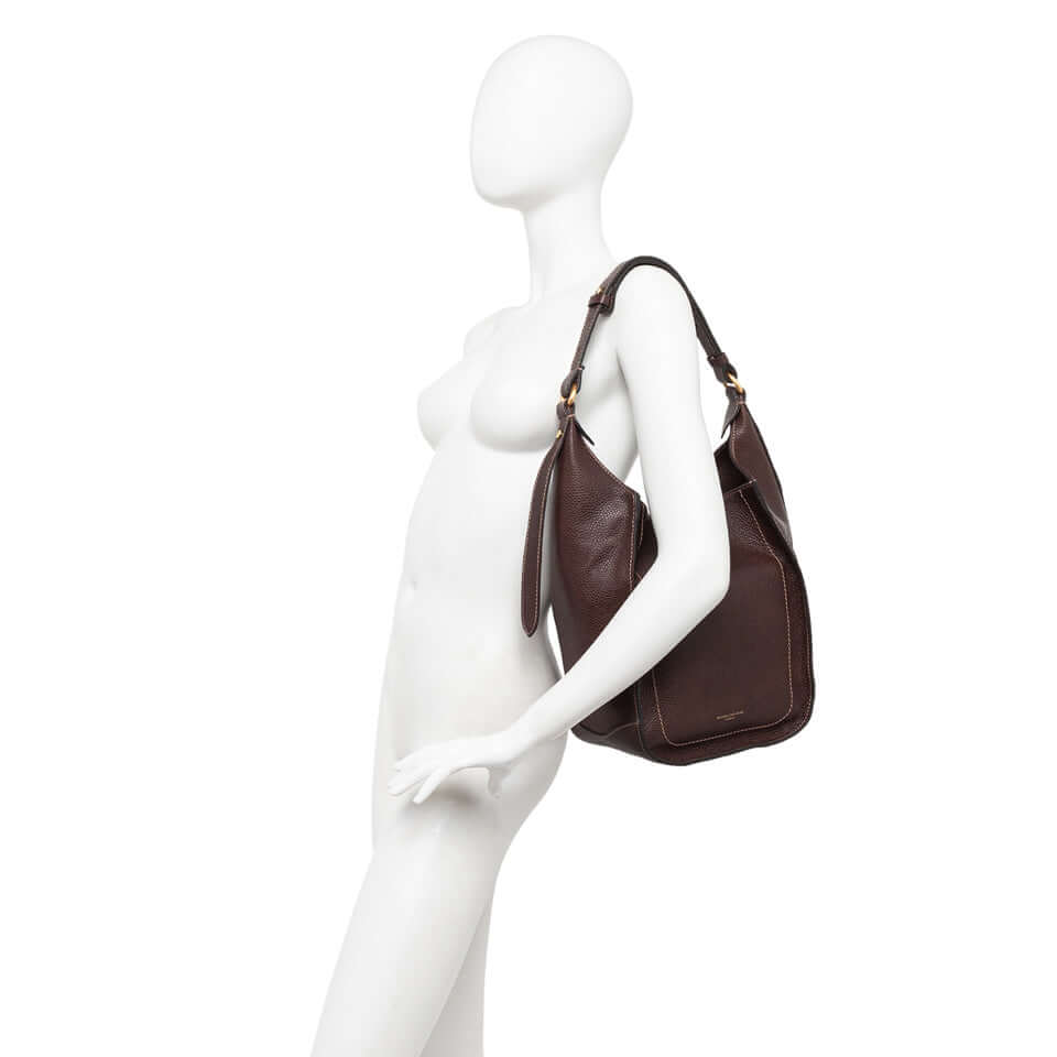 OLLY bag by Gianni Chiarini in dark brown leather, showcased on a mannequin.