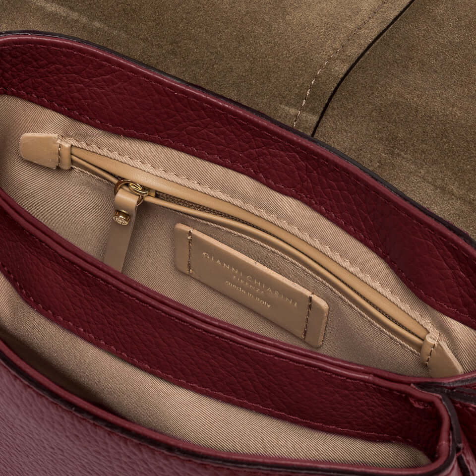 Interior view of Gianni Chiarini Helena Round bag featuring a zippered pocket and high-quality lining.