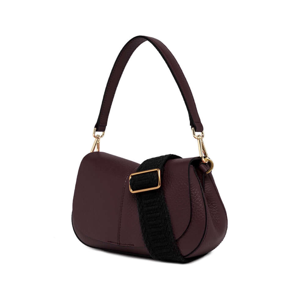 Helena Round bag by Gianni Chiarini in burgundy leather with adjustable straps and contemporary design.