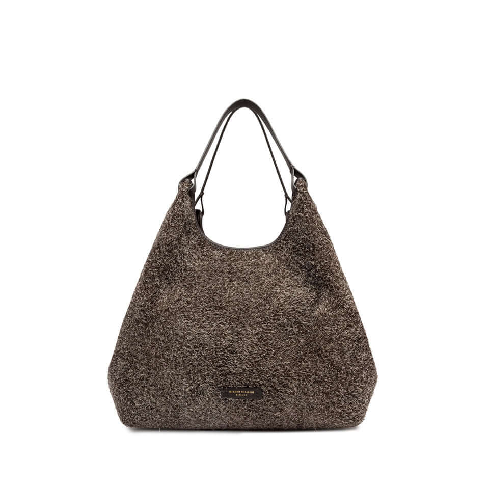 Dua bag in suede, spacious design with a zippered leather pouch, perfect for elevating your style.