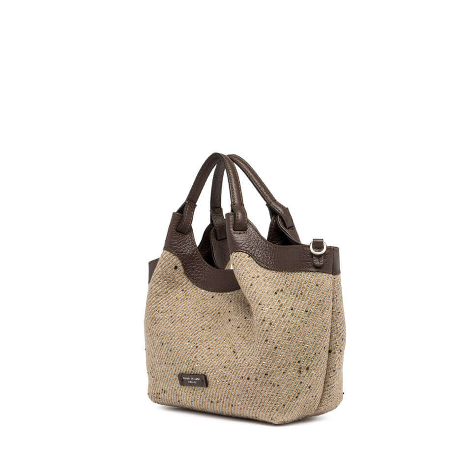 Borsa DUA in tessuto lana intrecciato con manici in pelle martellata, portabilità a mano o spalla.