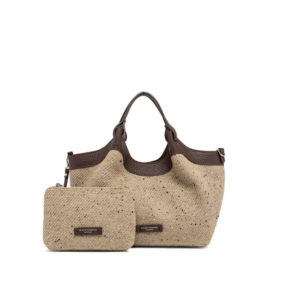 DUA woven wool handbag with brown leather accents and matching pouch, designed for versatile carrying options.
