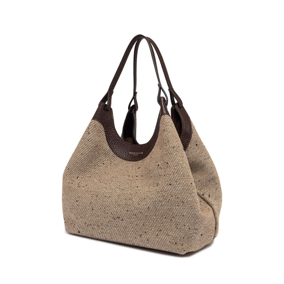 Elegant DUA bag in woven wool with leather details, featuring a spacious design and a matching zip pouch.