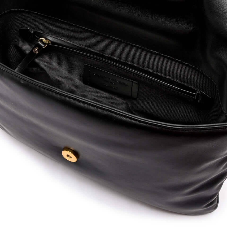 Interior view of the Mirea pochette by Gianni Chiarini, featuring a zip pocket and soft black leather.
