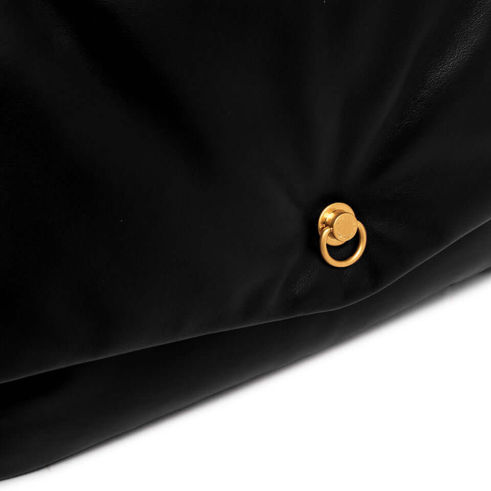 Close-up of Mirea pochette by Gianni Chiarini, featuring a soft black leather finish and gold logo detail.