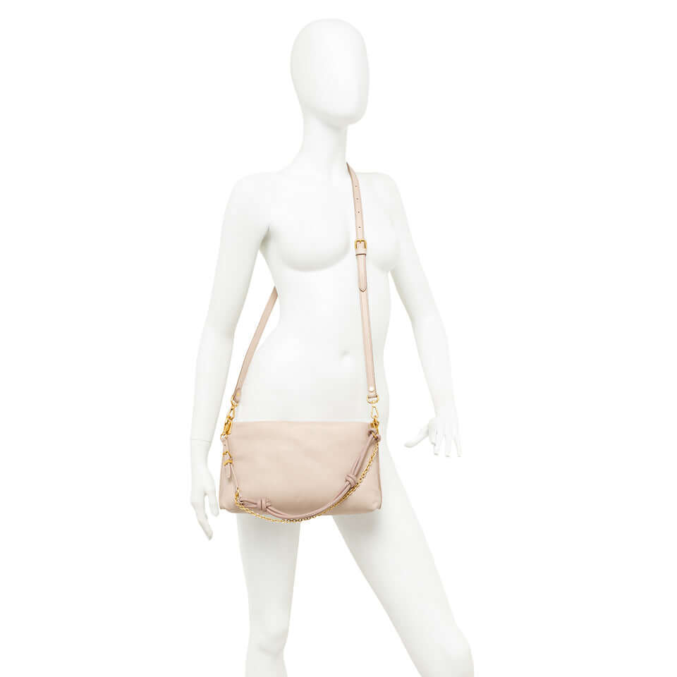 FANNY by Gianni Chiarini, a feminine leather shoulder bag with gold chain detail, perfect for evening wear.