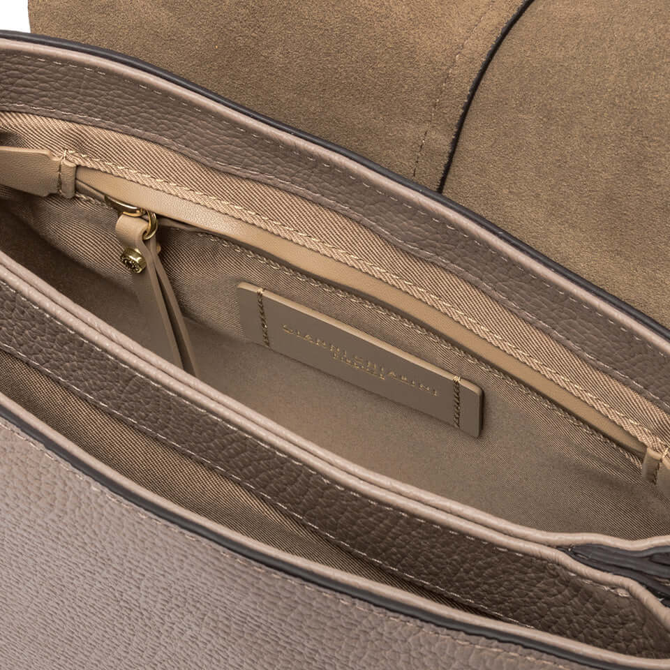 Interior view of the Helena Round bag, showcasing double compartment and sleek design features.