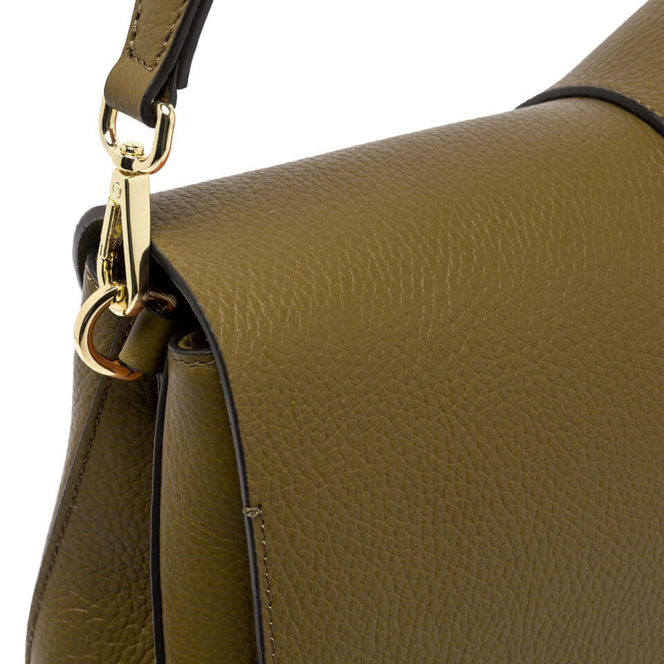 Close-up of the Helena Round bag in olive green leather with gold hardware and adjustable strap.
