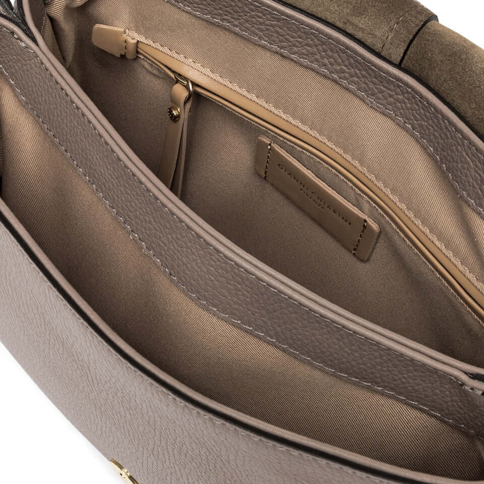 Interior view of the Helena Round bag by Gianni Chiarini, featuring double compartments and a zip pocket.