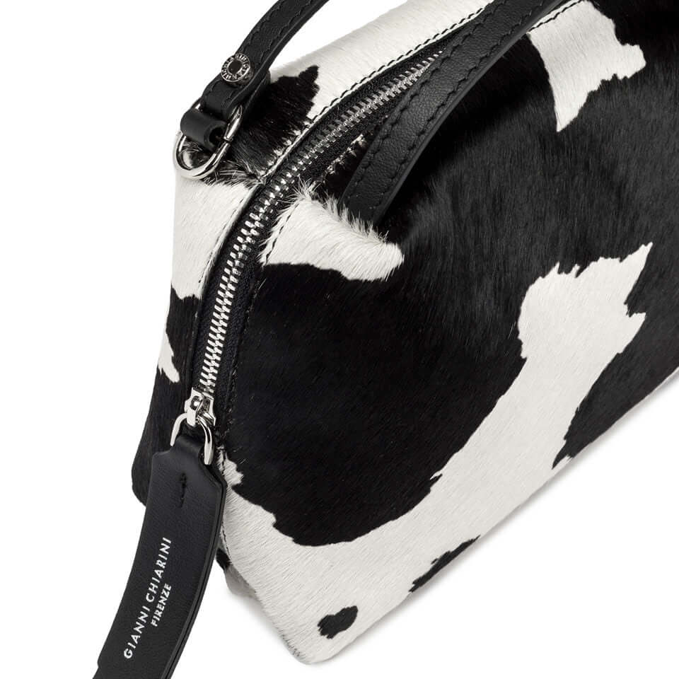 Elegant Alifa handbag by Gianni Chiarini in black and white cowhide leather, featuring dual handles and a slim shoulder strap.