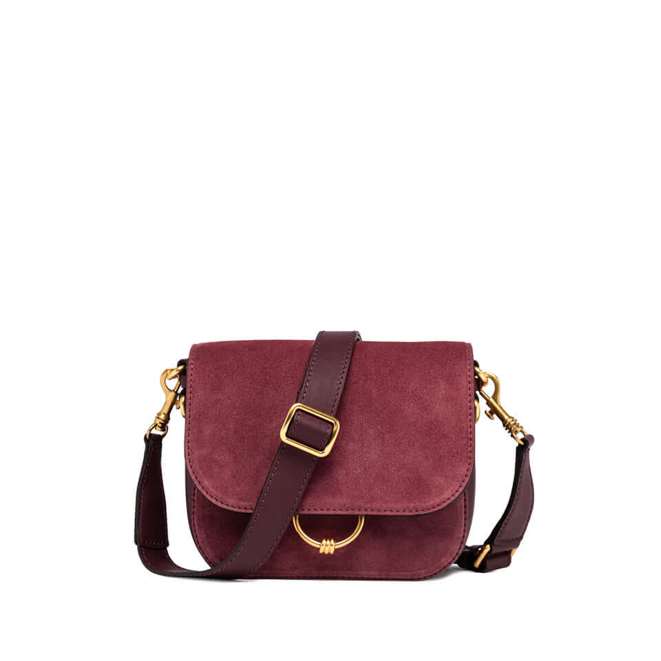 Meg crossbody bag in burgundy suede with metal charm, leather strap and multifunctional interior pocket.