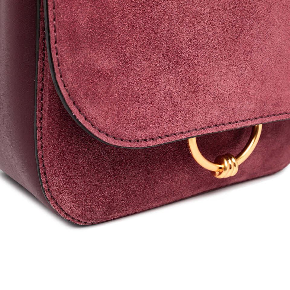 Meg crossbody bag in burgundy suede with gold charm closure and leather strap, dimensions 23x19x9 cm.