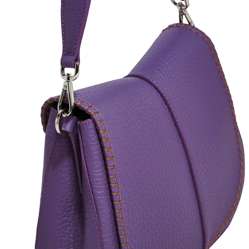 Helena Round purple leather bag with contrast stitching and removable adjustable strap.