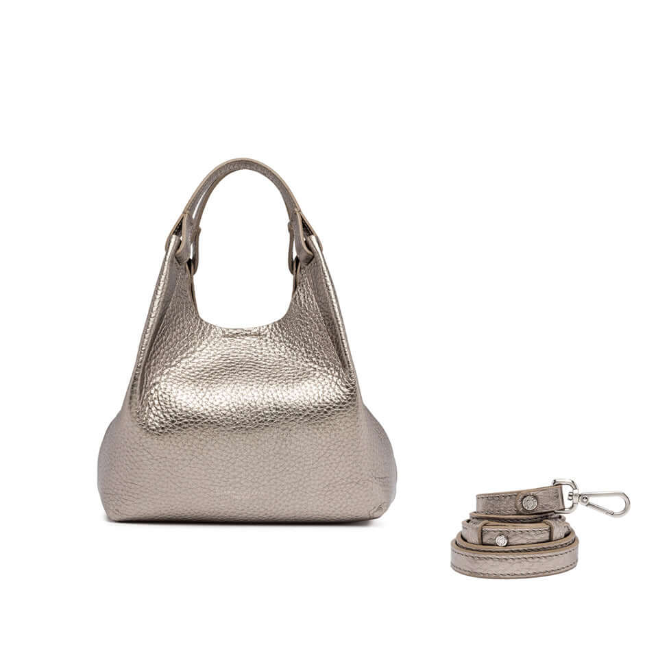 Elegant DUA handbag in double grain leather with two handles and detachable strap. Dimensions: 24x27x12 cm.