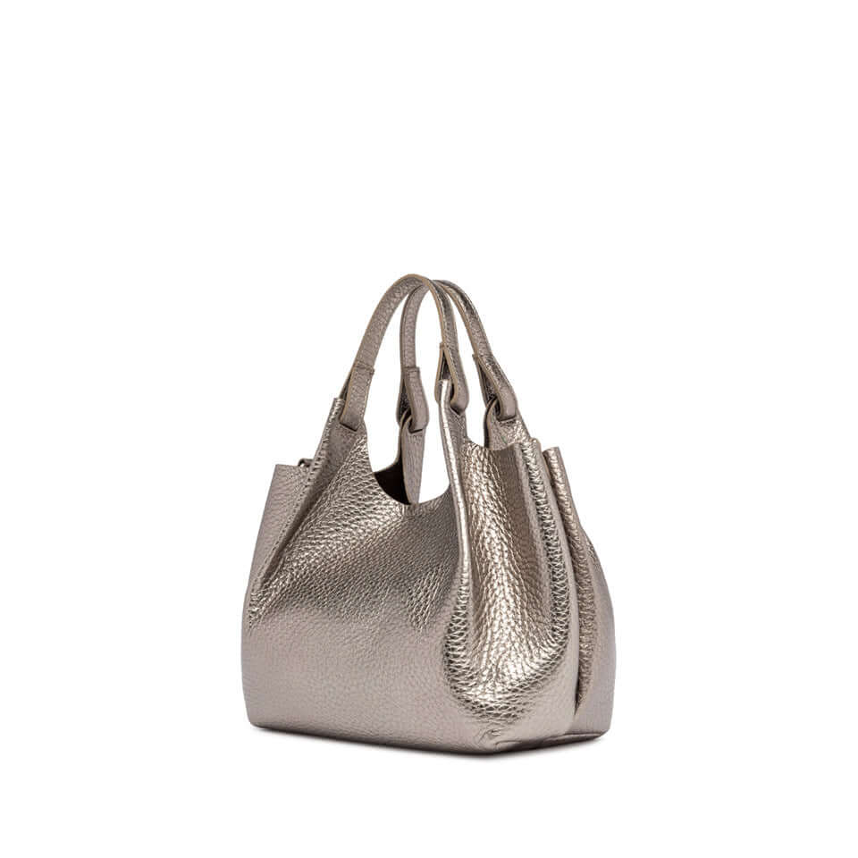 Elegant DUA handbag in textured silver leather with dual handles and a minimalist design.