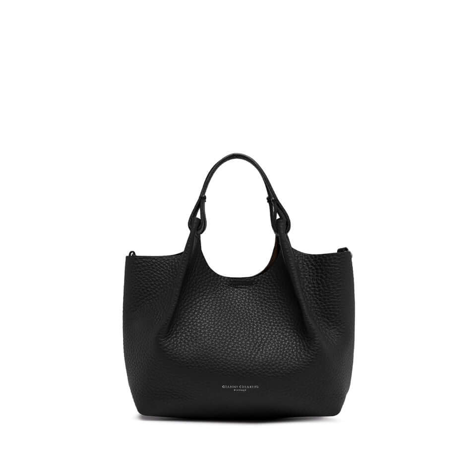 Elegant black DUA handbag in double grain leather, featuring leather handles and magnet closure, size 24x27x12 cm.