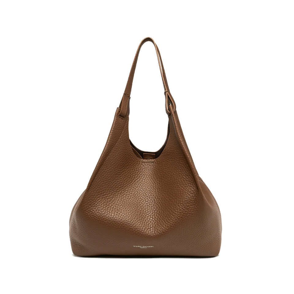 Elegant DUA leather bag in brown, featuring double grain texture and practical design. Perfect for any woman's look.