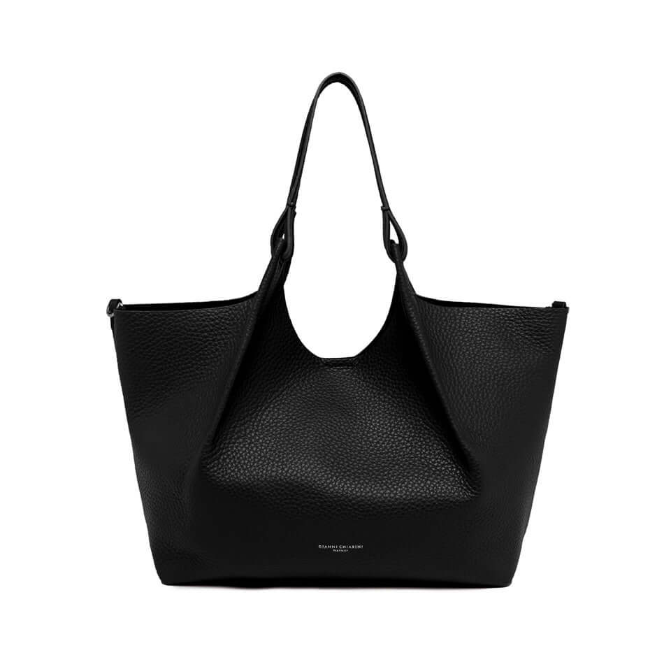 Black DUA handbag made of double grained leather, elegant and practical with two leather handles and magnetic closure.