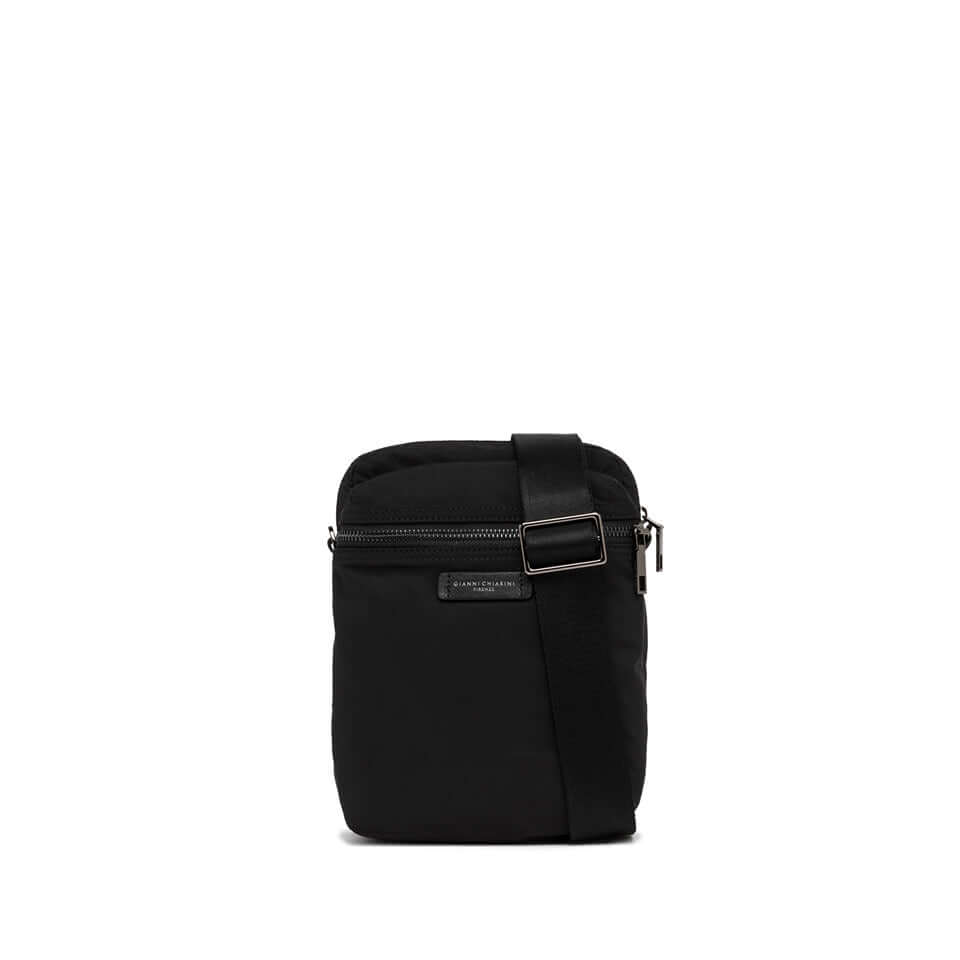 Black Oslo crossbody bag for sporty men, featuring nylon material, leather accents, and adjustable strap.