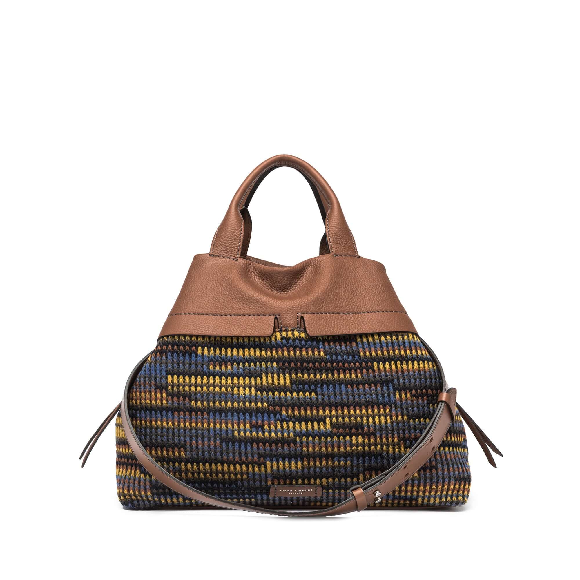Duna multicolor tote bag with leather details, zip closure, and adjustable strap. Dimensions: 35x31x17 cm.