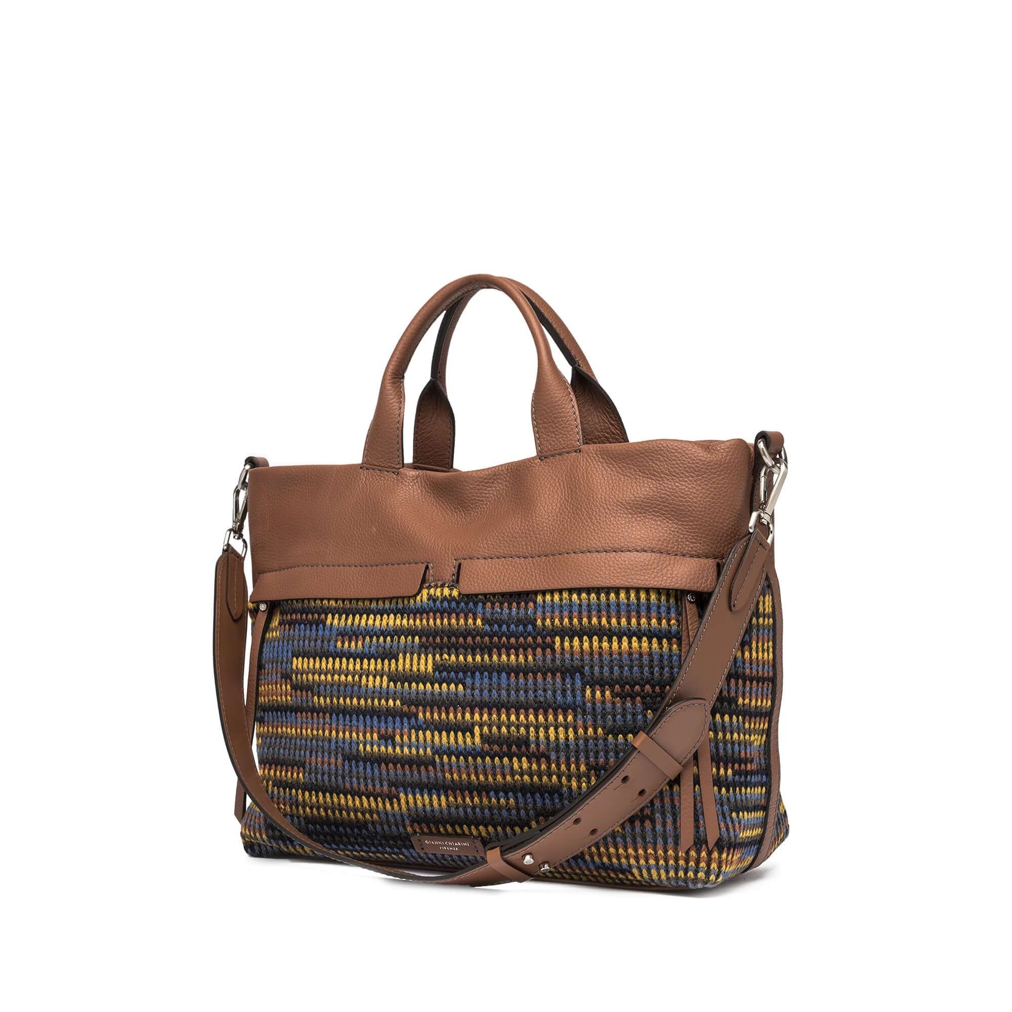 DUNA multicolor tote bag with leather finishes and zip pockets, featuring detachable leather strap.