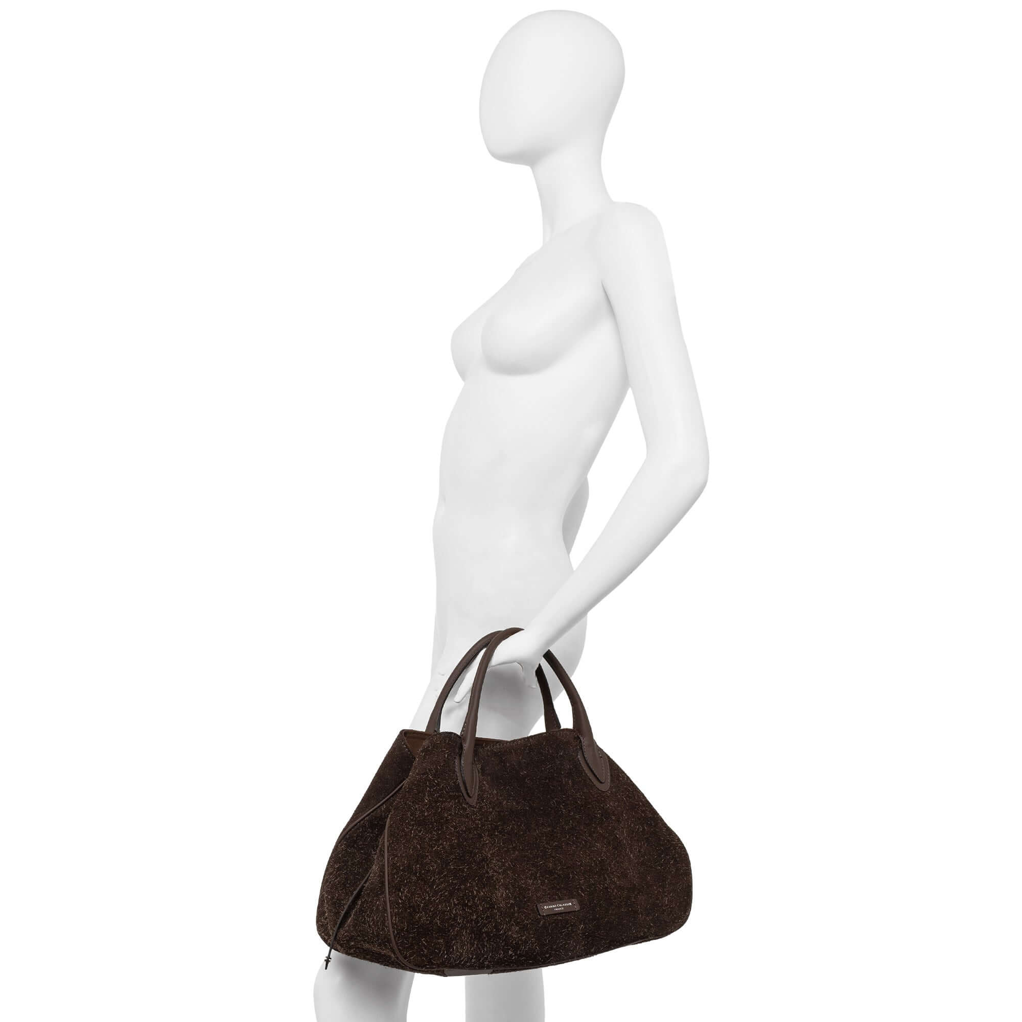 Judy bag by Gianni Chiarini in soft suede, showcasing its stylish design and shoulder strap, ideal for daily use.