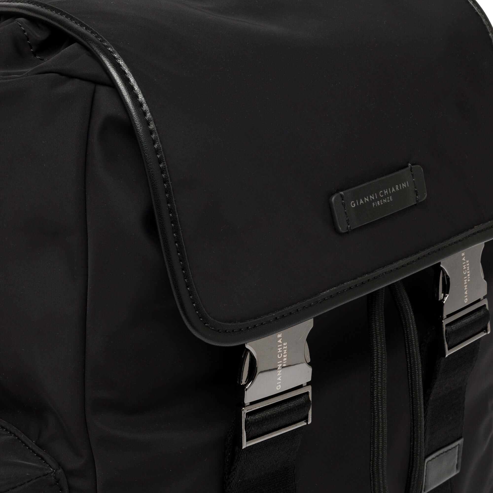 Gianni Chiarini Firenze Oslo black nylon backpack with leather trim and metal buckles.