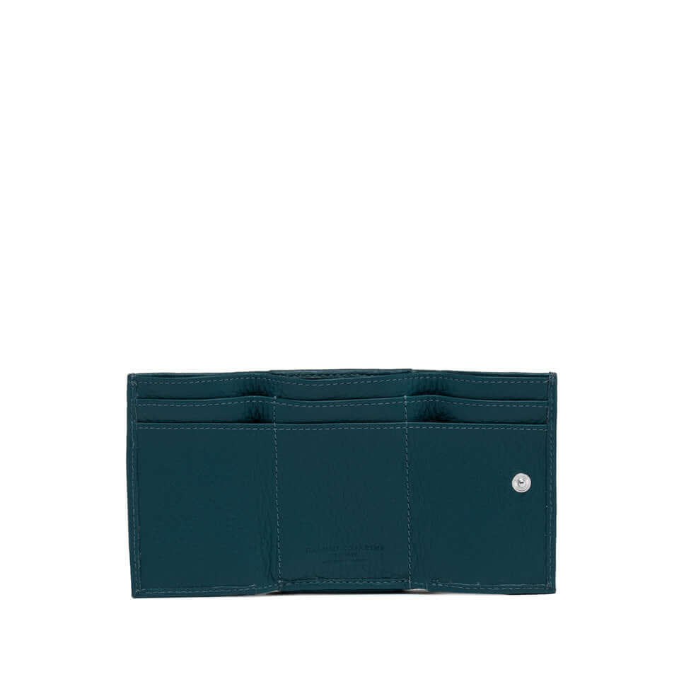 Interior view of Gianni Chiarini Firenze wallet in green leather, featuring card slots and snap button closure.
