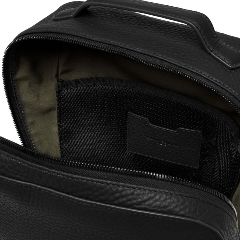 Interior view of the Gianni Chiarini Firenze FLORENCE backpack showcasing the textured leather and main compartment design.