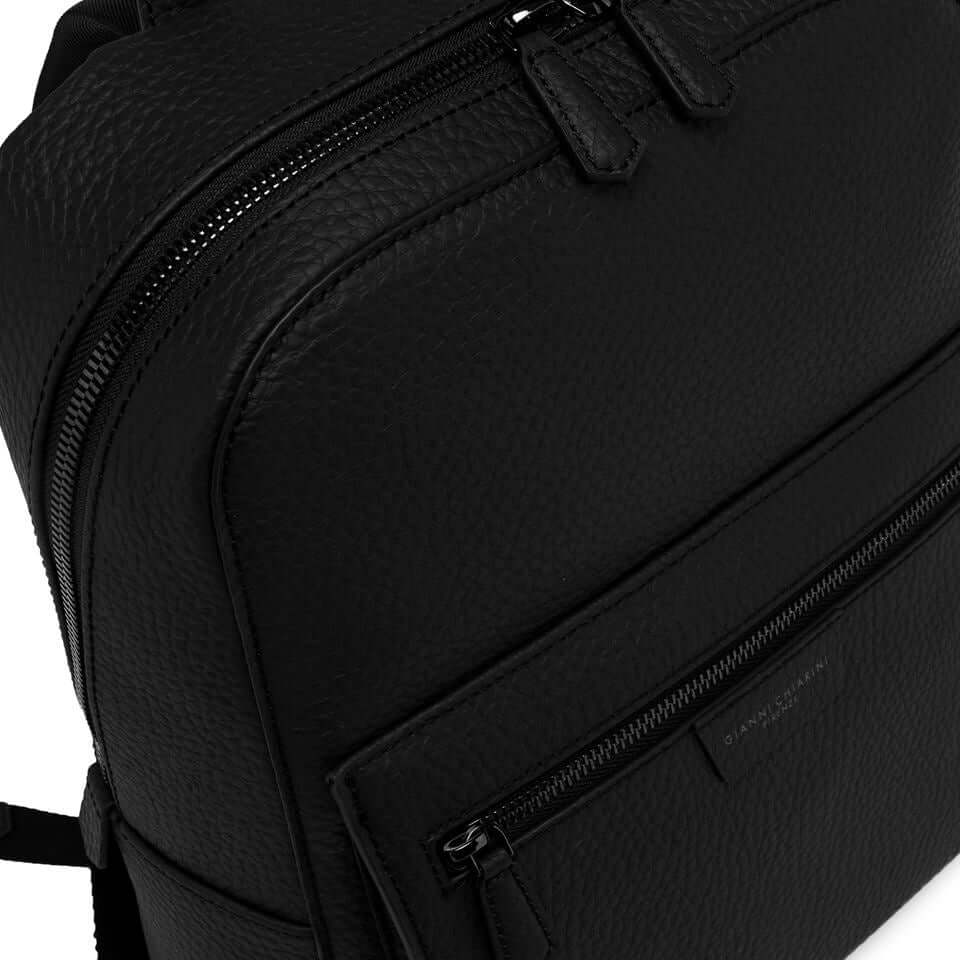 FLORENCE by Gianni Chiarini, minimal black leather backpack with zip compartments, perfect for stylish functionality.