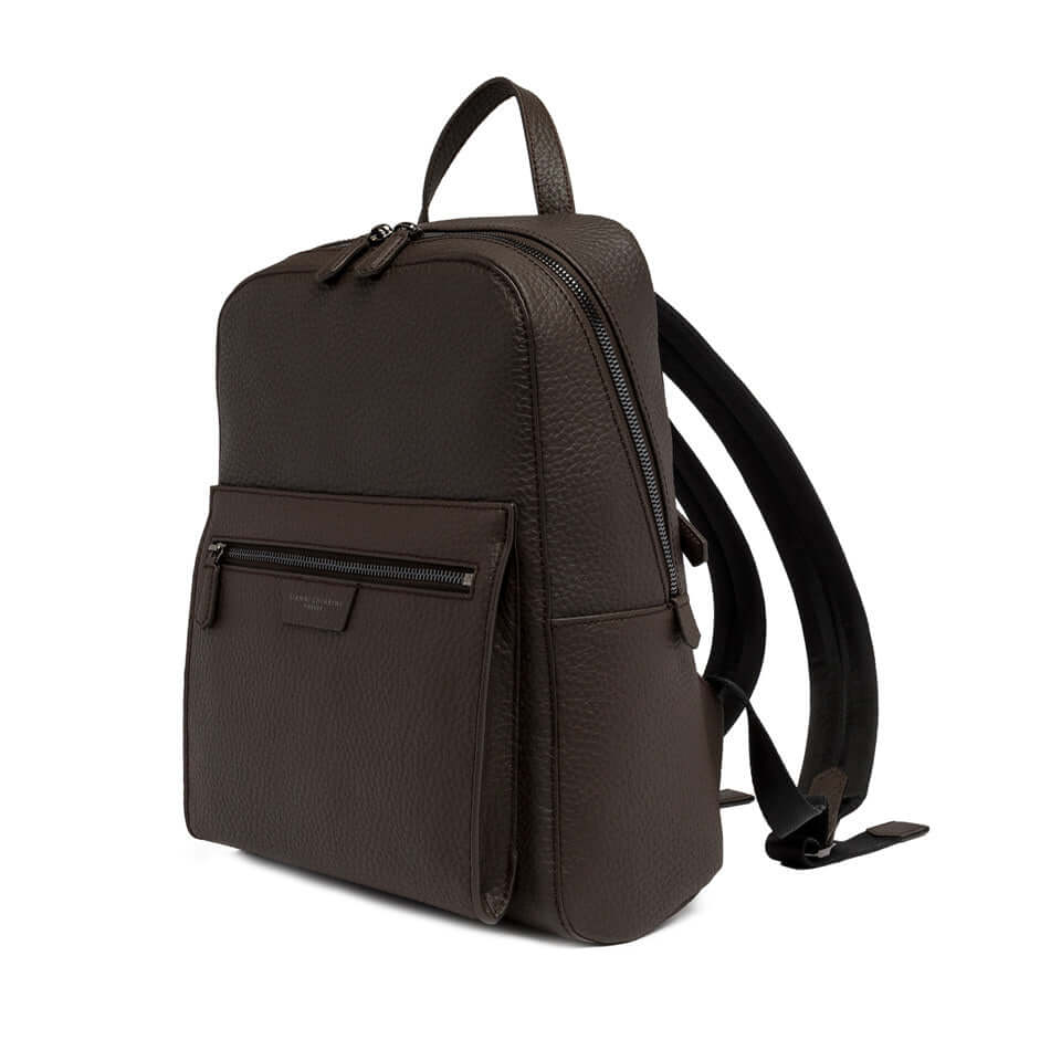 Brown leather backpack by Gianni Chiarini, featuring minimal design and zip compartments for style and functionality.