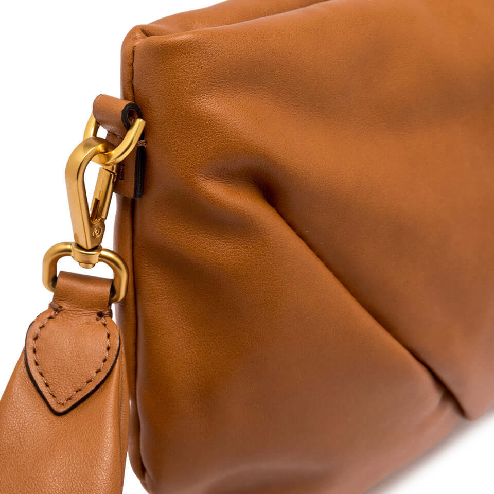 Close-up of Allegra modern leather clutch by Gianni Chiarini Firenze with pouffy effect and chain strap.