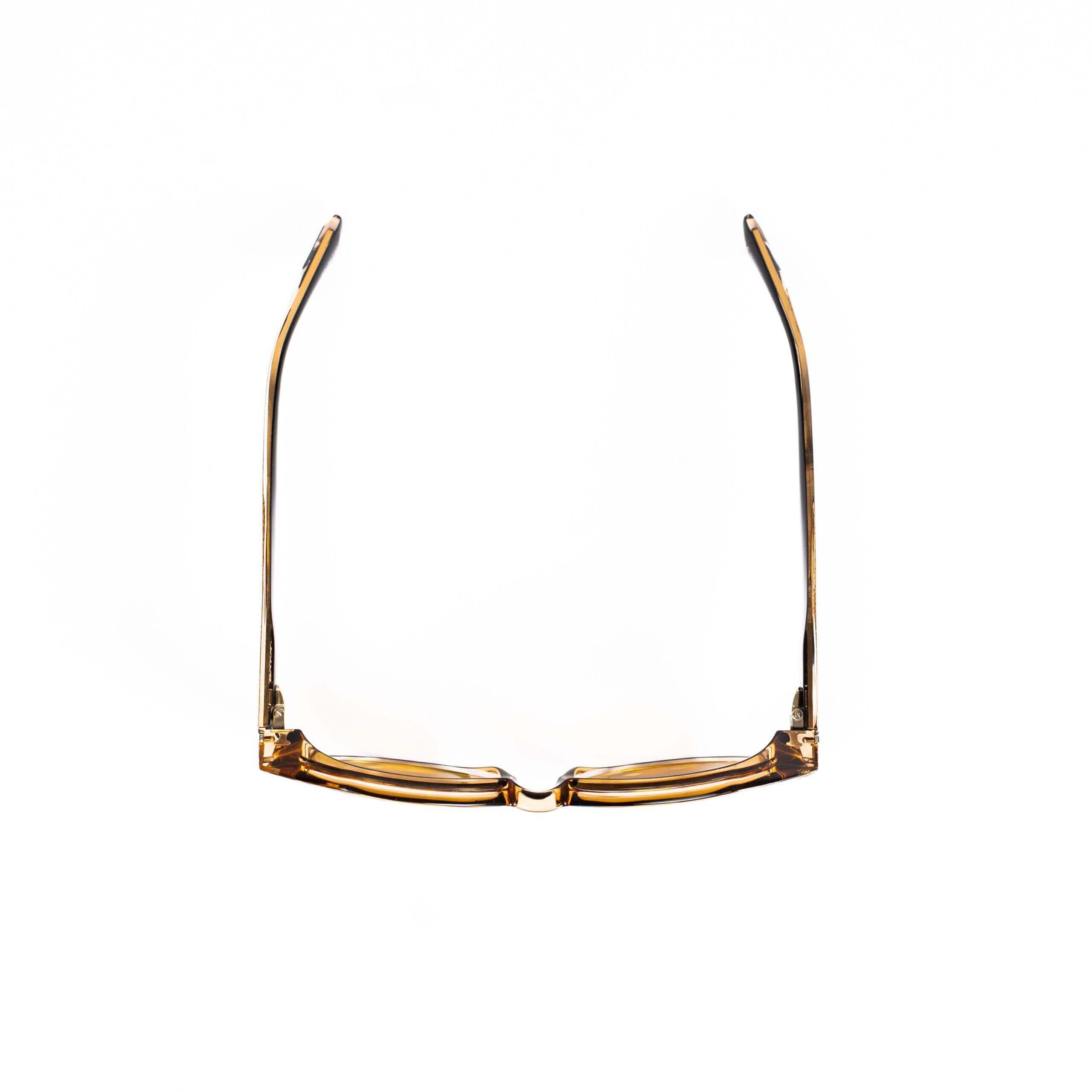 BAL HARBOUR C30 occhiali con frontale ambra trasparente e aste metalliche eleganti.